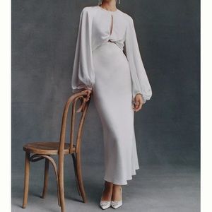 The Significant Other Demi midi dress w/ full-length blouson sleeves.